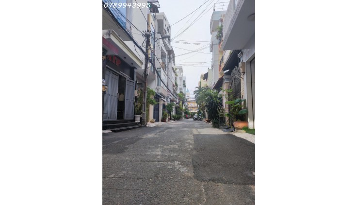 Bán nhà Quận 10,2 mặt hẻm xe hơi, 4mx20m – 10 bước ra mặt tiền - Giá 15 tỷ5