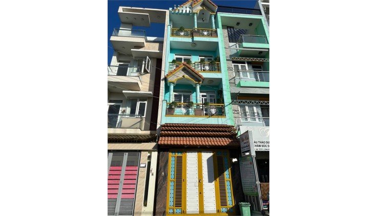 Nhà đẹp 5 tầng ốp gỗ Căm Xe, 4x15m, Đường 10m thông, Phường 12, Gò Vấp, chỉ 7.49 tỷ