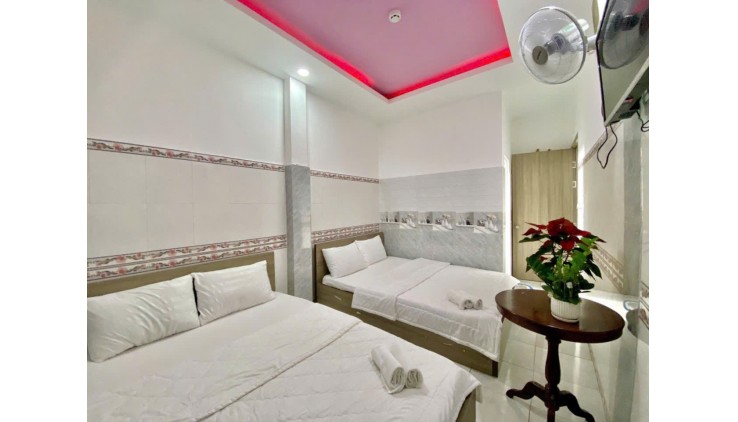 Bán Khách sạn 6 lầu MT Hà Huy Giáp 202m2 (6.5x31) 32PN DT 100tr gần cầu Phú Long 26 tỷ.