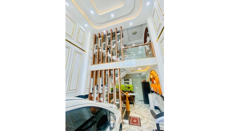 NHÀ 5 TẦNG ĐƯỜNG NHỰA 8M THÔNG - KHU VIP TRUNG MỸ TÂY - XE HƠI NGỦ TRONG NHÀ. giá 6,2 tỷ.