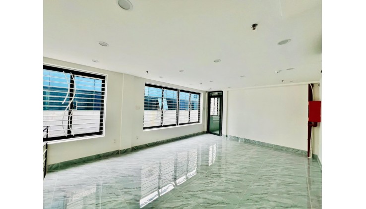 Bán nhà 80/22 Dương Quảng Hàm, Dt 5x22m, hầm 6 lầu thang máy. Giá 25 tỷ