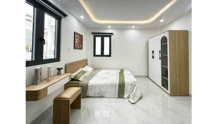 Bán Nhà Lê Quang Định 5 Tầng 3 PN Giá Chỉ Nhỉnh 4 Tỉ