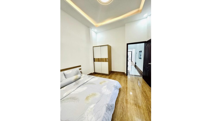 NHÀ 2 TẦNG TK HIỆN ĐẠI MỘT TRỤC ĐƯỜNG THỐNG NHẤT HXH 7M THÔNG.