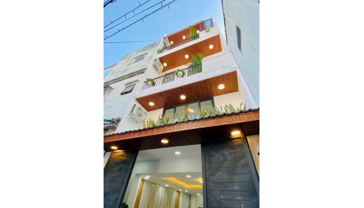 6.3 tỷ- bán nhà mới đẹp 4 tầng hẻm xe hơi sát Mặt tiền Phan Văn Trị-khu Cityland- 4mx11,2m vuông vức