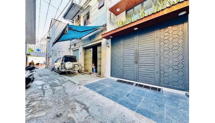 6.3 tỷ- bán nhà mới đẹp 4 tầng hẻm xe hơi sát Mặt tiền Phan Văn Trị-khu Cityland- 4mx11,2m vuông vức
