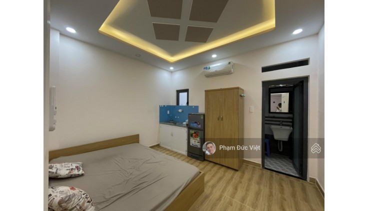 Bán tòa nhà CHDV thu nhập 50tr 4 tầng 9 phòng 8tỷ5 HXH Hoàng Hoa Thám P5 Bình Thạnh gấp gấp