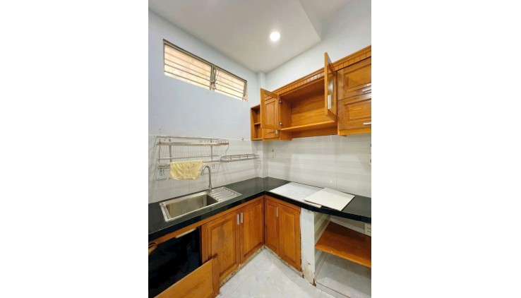 3.95 tỷ- bán nhà 3 tầng đúc hẻm Bùi Đình Túy- 7mx4m- CN 25m2- sau căn mặt tiền