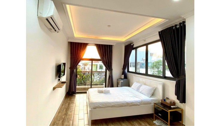BÁN GẤP KHÁCH SẠN GẦN SÂN BAY - QUẬN TÂN BÌNH - ĐANG KINH DOANH TỐT