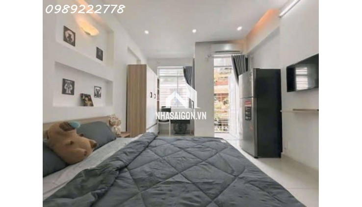 CHDV KHU PHAN XÍCH LONG -P7 - 7 TẦNG, CÓ HẦM, THANG MÁY - 12 PHÒNG + 1 MBKD - 128M2 (5.6x23) - HXH - DT 85Tr/th.